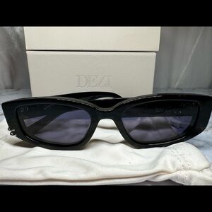 DEZI cuffed black midnight smoke worn once. Like new have the original packaging